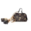 Cute mini leather bag, coin purse, earphone case, storage bag, monogram pendant, key card case, key case for women Item Picture